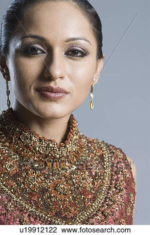 Portrait of a mid adult woman in salwar kameez View Large Photo Image Stock Image - Portrait of a mid adult woman in salwar kameez. Fotosearch