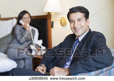 Portrait of a businessman smiling View Large Photo Image Stock Photography - Portrait of a businessman smiling. Fotosearch