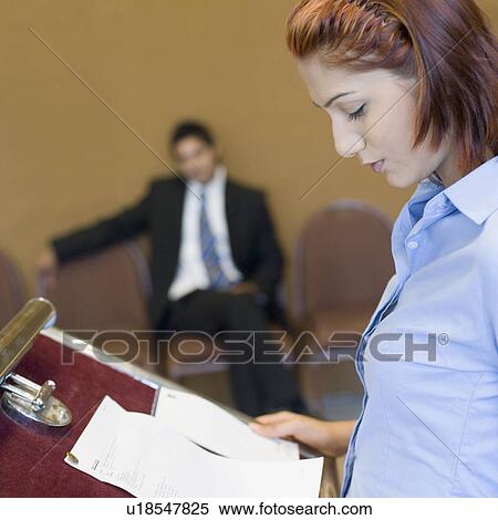 Side profile of a businesswoman giving a speech View Large Photo Image Stock Photography - Side profile of a businesswoman giving a speech. Fotosearch
