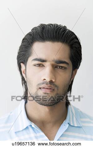 Portrait of a young man View Large Photo Image Stock Photograph - Portrait of a young man. Fotosearch