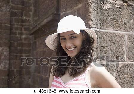 Portrait of a young woman smiling, Goa, India View Large Photo Image Stock Photo - Portrait of a young woman smiling, Goa, India. Fotosearch