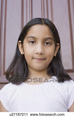 Portrait of a girl smiling View Large Photo Image Stock Image - Portrait of a girl smiling. Fotosearch