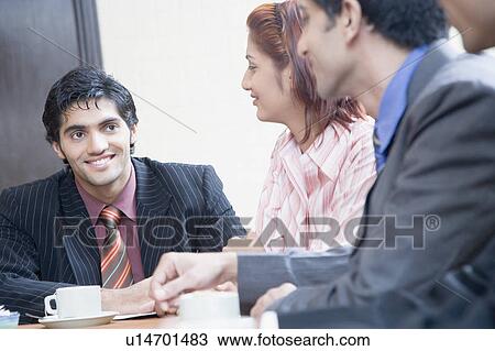 Business executives in a conference room View Large Photo Image Stock Image - Business executives in a conference room. Fotosearch