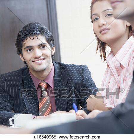 Business executives in a conference room View Large Photo Image Stock Photography - Business executives in a conference room. Fotosearch