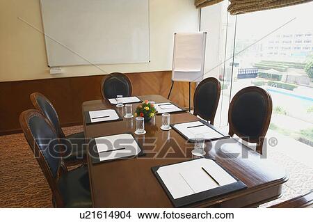 Interiors of an empty conference room View Large Photo Image Picture - Interiors of an empty conference room. Fotosearch
