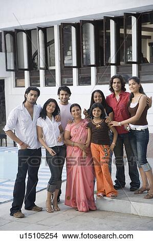 Group of people standing at a poolside View Large Photo Image Picture - Group of people standing at a poolside. Fotosearch