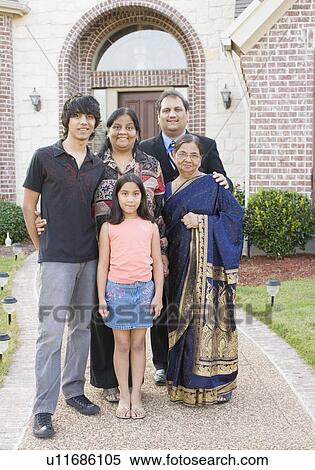 Portrait of a family standing together View Large Photo Image Stock Photography - Portrait of a family standing together. Fotosearch