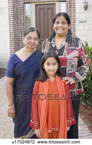 Portrait of a girl standing with her mother and grandmother View Large Photo Image Stock Image - Portrait of a girl standing with her mother and grandmother. Fotosearch