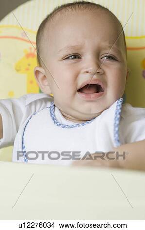 Close-up of a baby boy crying View Large Photo Image Picture - Close-up of a baby boy crying. Fotosearch