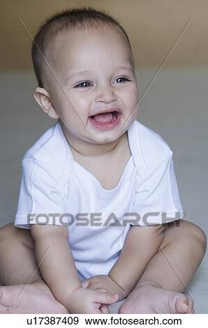 Stock Photo - Close-up of a baby boy smiling. Fotosearch