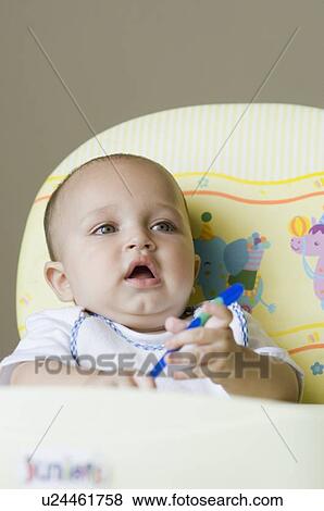 Close-up of a baby boy View Large Photo Image Stock Photo - Close-up of a baby boy. Fotosearch