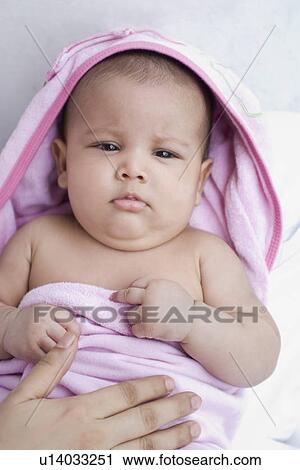 Close-up of a person hand on a baby boy View Large Photo Image Stock Image - Close-up of a person hand on a baby boy. Fotosearch