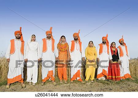 Portrait of four young couples standing side by side View Large Photo Image Picture - Portrait of four young couples standing side by side. Fotosearch