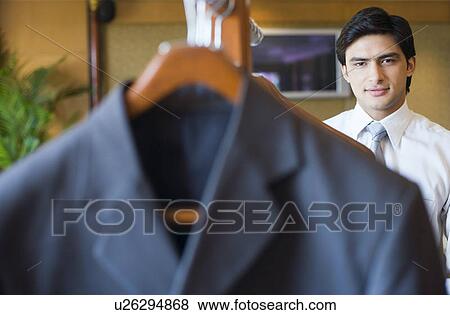 Portrait of a businessman smiling View Large Photo Image Stock Photo - Portrait of a businessman smiling. Fotosearch