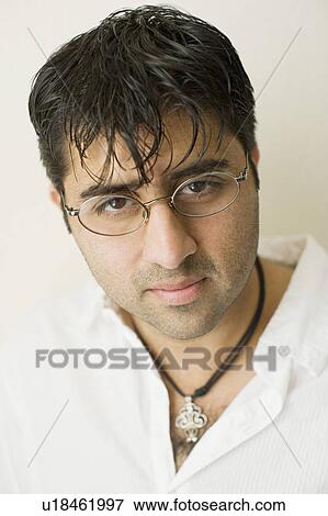 Stock Photo - Portrait of a mid adult man. Fotosearch
