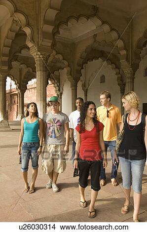 Picture - Three young couples walking together in a mausoleum, Taj Mahal, Agra, Uttar Pradesh, India. Fotosearch