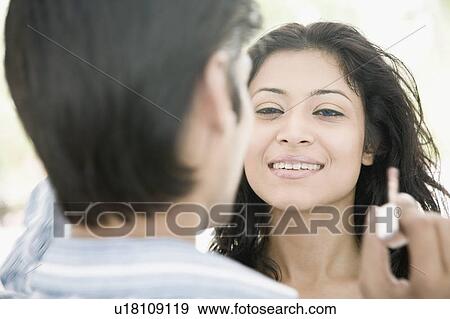 Close-up of a young couple face to face View Large Photo Image Stock Photo - Close-up of a young couple face to face. Fotosearch