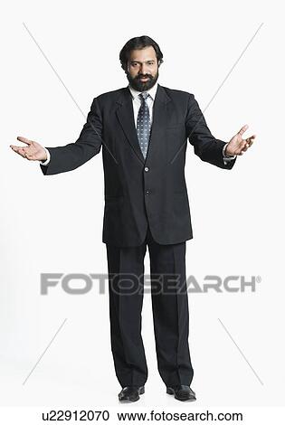 Stock Image - Portrait of a businessman gesturing. Fotosearch