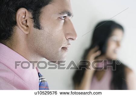 Stock Photograph - Side profile of a businessman. Fotosearch