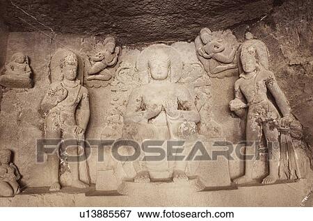 Statue in a cave, Ellora, Aurangabad, Maharashtra, India View Large Photo Image Stock Photo - Statue in a cave, Ellora, Aurangabad, Maharashtra, India. Fotosearch
