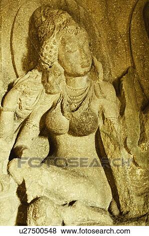 Statue in a cave, Ellora, Aurangabad, Maharashtra, India View Large Photo Image Stock Photo - Statue in a cave, Ellora, Aurangabad, Maharashtra, India. Fotosearch