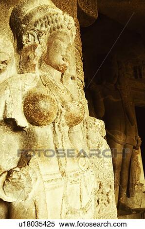 Statue in a cave, Ellora, Aurangabad, Maharashtra, India View Large Photo Image Stock Photography - Statue in a cave, Ellora, Aurangabad, Maharashtra, India. Fotosearch
