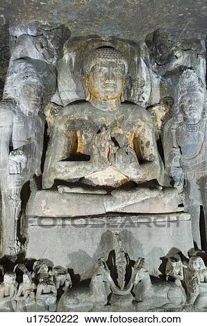 Stock Image - Statue of Buddha in a cave, Ajanta, Maharashtra, India. Fotosearch