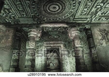 Stock Photography - Statue of Buddha in a cave, Ajanta, Maharashtra, India. Fotosearch