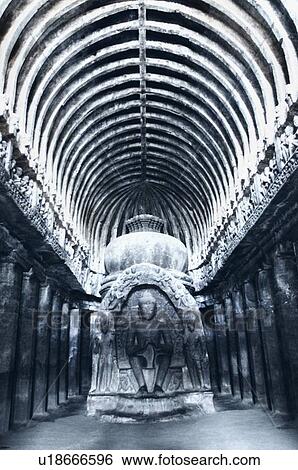 Stock Photograph - Statue of Buddha in a cave, Buddhist Chaitya Hall, Ellora, Aurangabad, Maharashtra, India. Fotosearch