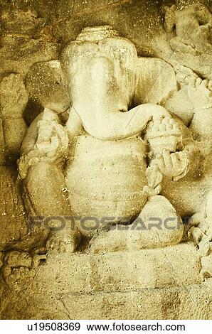 Statue of God Ganesha in a cave, Ellora, Aurangabad, Maharashtra, India View Large Photo Image Stock Photo - Statue of God Ganesha in a cave, Ellora, Aurangabad, Maharashtra, India. Fotosearch