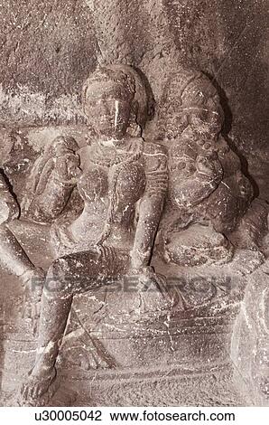 Statues carved in a cave, Ellora, Aurangabad, Maharashtra, India View Large Photo Image Stock Image - Statues carved in a cave, Ellora, Aurangabad, Maharashtra, India. Fotosearch