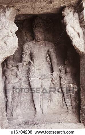 Statues carved in a cave, Ellora, Aurangabad, Maharashtra, India View Large Photo Image Stock Photo - Statues carved in a cave, Ellora, Aurangabad, Maharashtra, India. Fotosearch