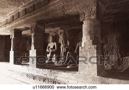 Stock Image - Statues in a cave, Ellora, Aurangabad, Maharashtra, India. Fotosearch