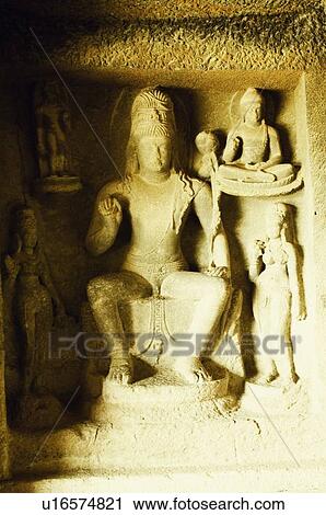 Statues in a cave, Ellora, Aurangabad, Maharashtra, India View Large Photo Image Stock Image - Statues in a cave, Ellora, Aurangabad, Maharashtra, India. Fotosearch