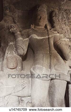 Stock Photo - Statues in a cave, Ellora, Aurangabad, Maharashtra, India. Fotosearch