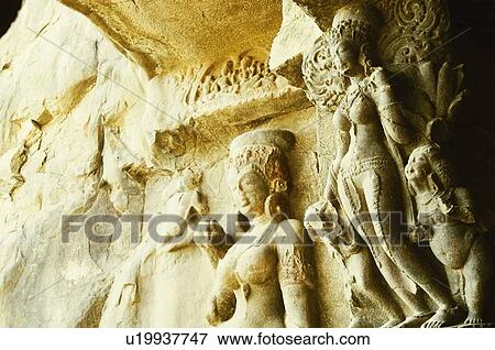 Stock Photo - Statues in a cave, Ellora, Aurangabad, Maharashtra, India. Fotosearch