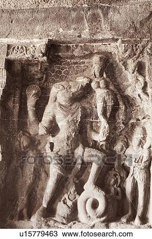 Stock Image - Statues of Hindu god carved in a cave, Ellora, Aurangabad, Maharashtra, India. Fotosearch