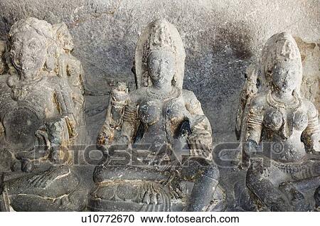 Stock Image - Statues of Hindu goddess carved in a cave, Ellora, Aurangabad, Maharashtra, India. Fotosearch
