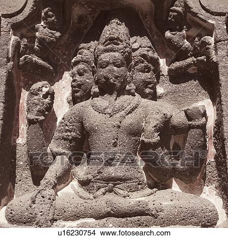 Picture - Statues of Hindu gods in a cave, Ellora, Aurangabad, Maharashtra, India. Fotosearch