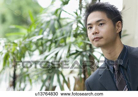 Close-up of a businessman View Large Photo Image Stock Image - Close-up of a businessman. Fotosearch