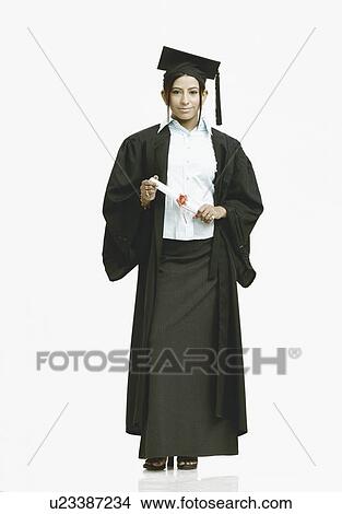 Picture - Portrait of a female graduate holding a diploma. Fotosearch