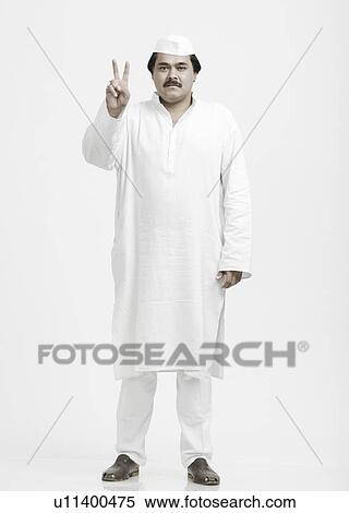 Stock Photography - Portrait of a male politician showing a peace sign. Fotosearch