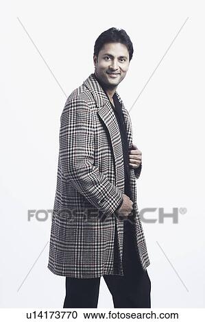 Side profile of a mid adult man smiling View Large Photo Image Stock Image - Side profile of a mid adult man smiling. Fotosearch