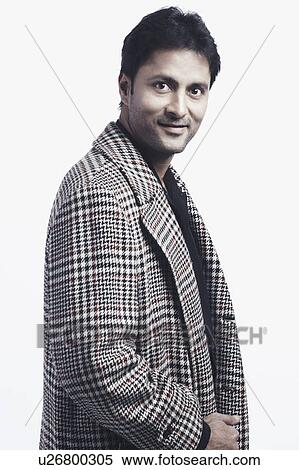 Side profile of a mid adult man smiling View Large Photo Image Stock Photography - Side profile of a mid adult man smiling. Fotosearch