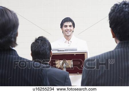 Businessman giving speech in a seminar View Large Photo Image Picture - Businessman giving speech in a seminar. Fotosearch