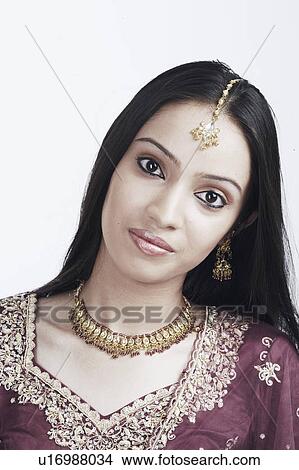 Portrait of a teenage girl in a traditional dress View Large Photo Image Picture - Portrait of a teenage girl in a traditional dress. Fotosearch