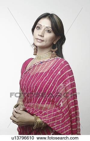 Close-up of a mid adult woman looking up View Large Photo Image Stock Image - Close-up of a mid adult woman looking up. Fotosearch