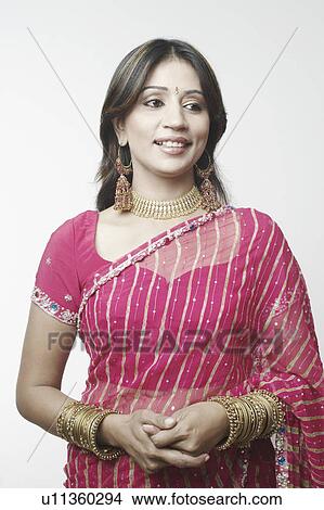 Close-up of a mid adult woman smiling View Large Photo Image Picture - Close-up of a mid adult woman smiling. Fotosearch