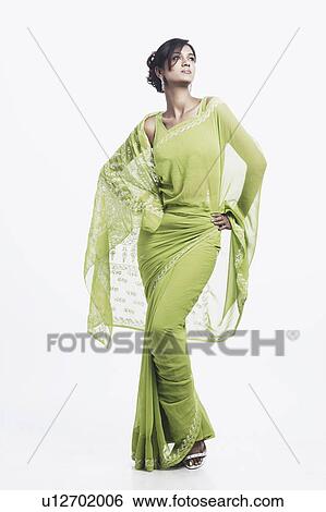Close-up of a young woman posing View Large Photo Image Stock Photograph - Close-up of a young woman posing. Fotosearch