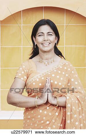 Portrait of a mature woman greeting View Large Photo Image Stock Image - Portrait of a mature woman greeting. Fotosearch